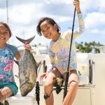 Girls with a trevally